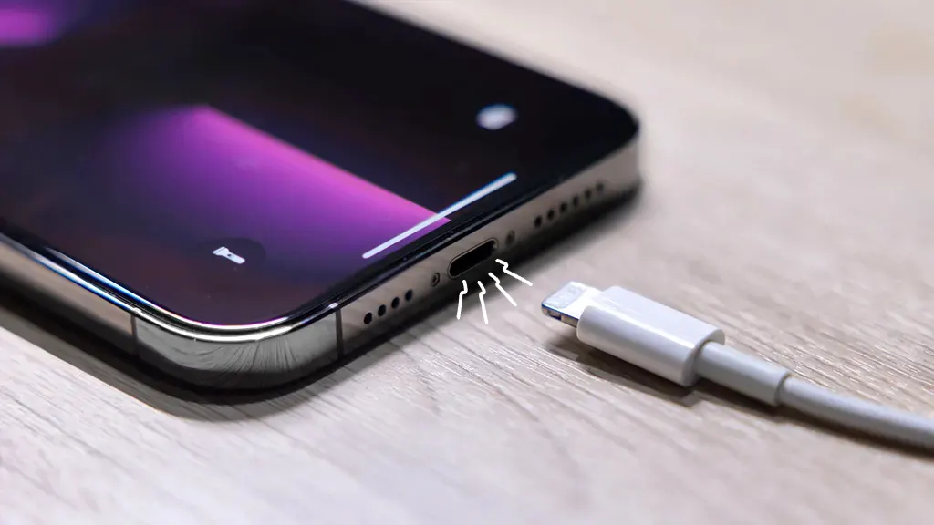 iPhone podłączony do ładowarki który nie reaguje na ładowanie